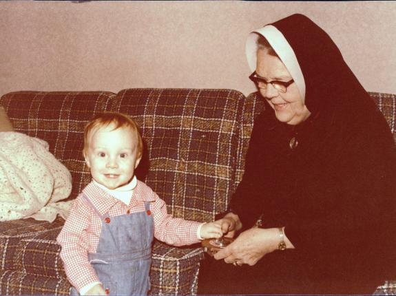 Sr. Mary Stanislaus with a former student's little son Francis!